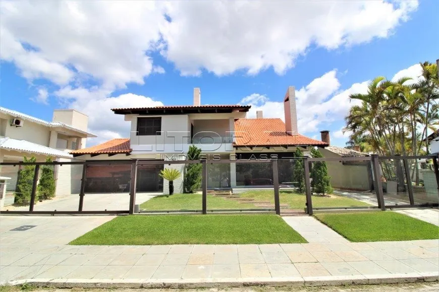 Foto 1 de Casa com 5 Quartos à venda, 300m² em Atlantida, Xangri-lá