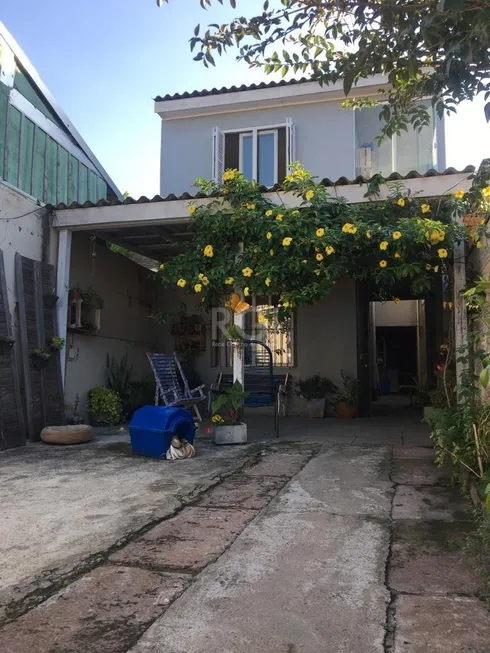 Foto 1 de Casa com 2 Quartos à venda, 72m² em Hípica, Porto Alegre