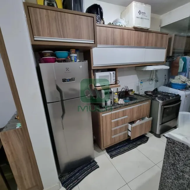 Foto 1 de Apartamento com 2 Quartos à venda, 58m² em Jardim Holanda, Uberlândia