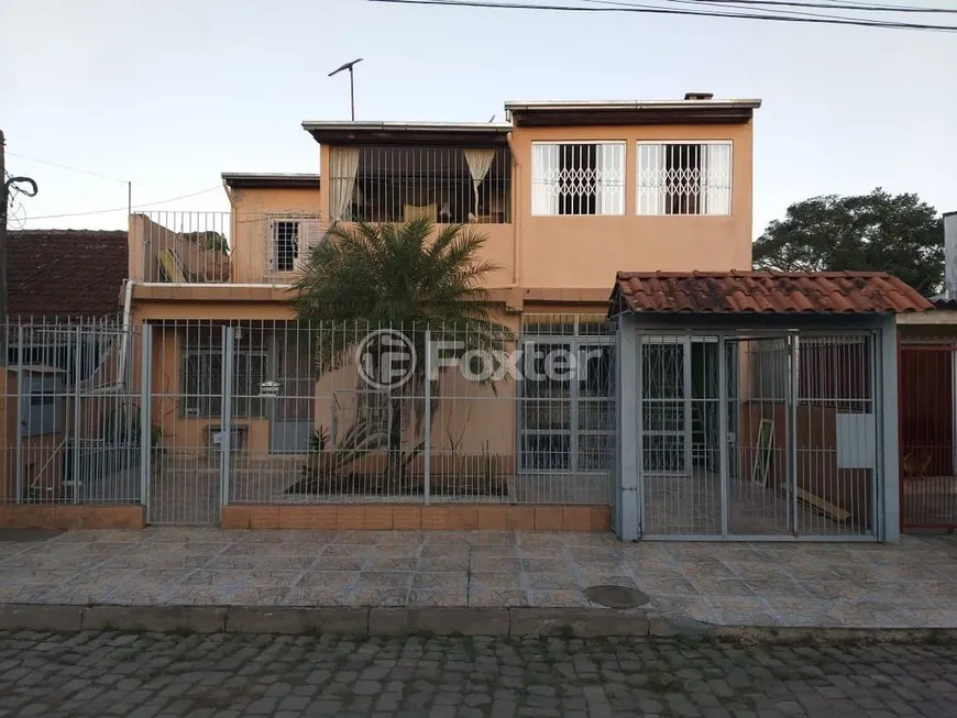 Foto 1 de Casa com 4 Quartos à venda, 250m² em Restinga, Porto Alegre