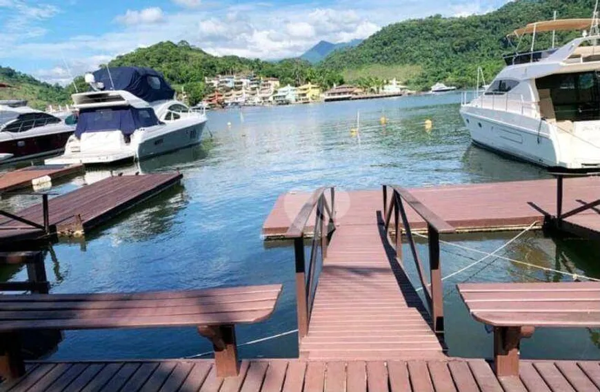 Foto 1 de Casa de Condomínio com 4 Quartos à venda, 115m² em Centro, Angra dos Reis