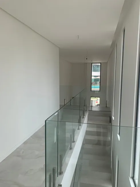 Foto 1 de Casa de Condomínio com 4 Quartos à venda, 200m² em Abrantes, Camaçari