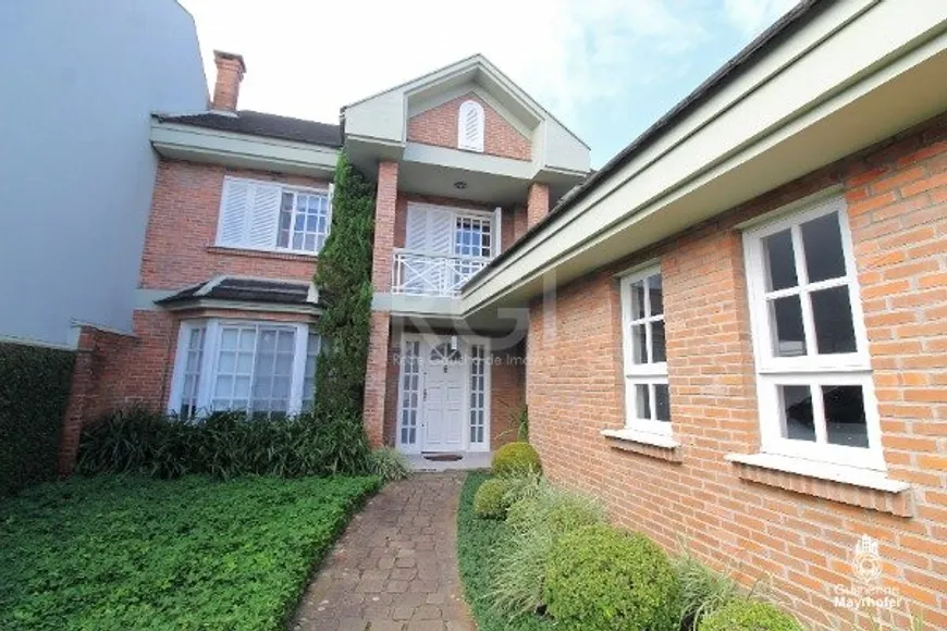 Foto 1 de Casa de Condomínio com 4 Quartos à venda, 224m² em Agronomia, Porto Alegre