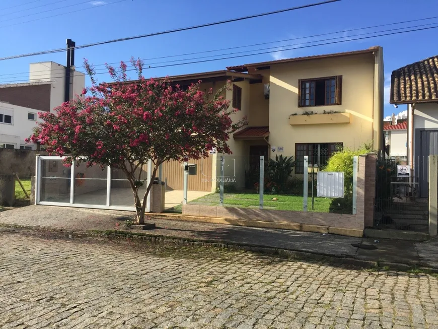 Foto 1 de Casa com 4 Quartos à venda, 250m² em Itacorubi, Florianópolis