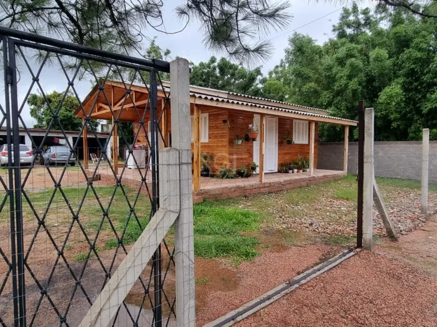 Foto 1 de Casa com 2 Quartos à venda, 319m² em Chapéu do Sol, Porto Alegre