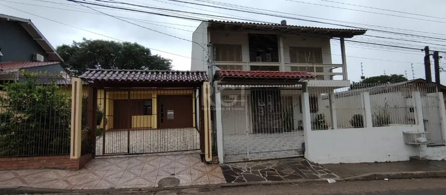 Foto 1 de Casa com 4 Quartos à venda, 179m² em Campo Novo, Porto Alegre