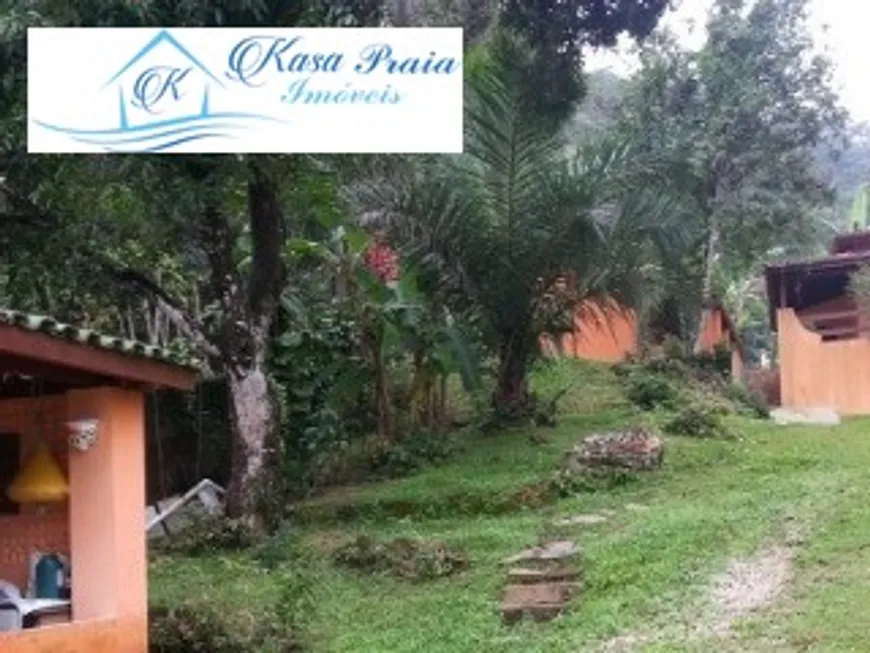 Foto 1 de Casa com 4 Quartos à venda, 150m² em Martim de Sa, Caraguatatuba