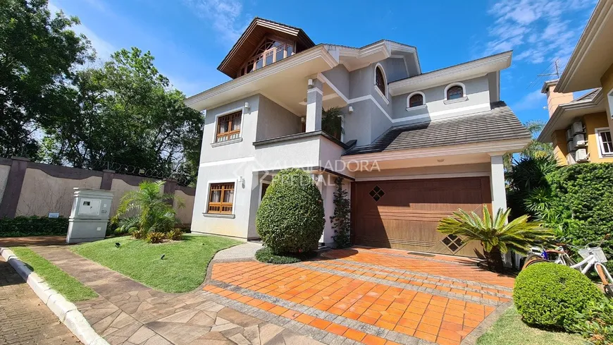 Foto 1 de Casa de Condomínio com 5 Quartos à venda, 540m² em Marechal Rondon, Canoas