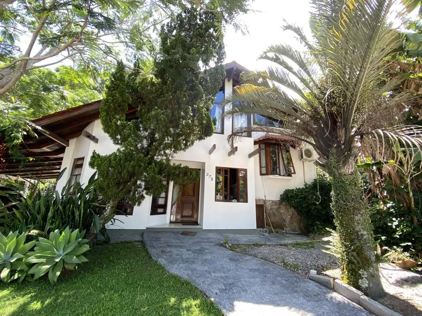 Foto 1 de Casa com 3 Quartos para alugar, 210m² em Jurerê Internacional, Florianópolis