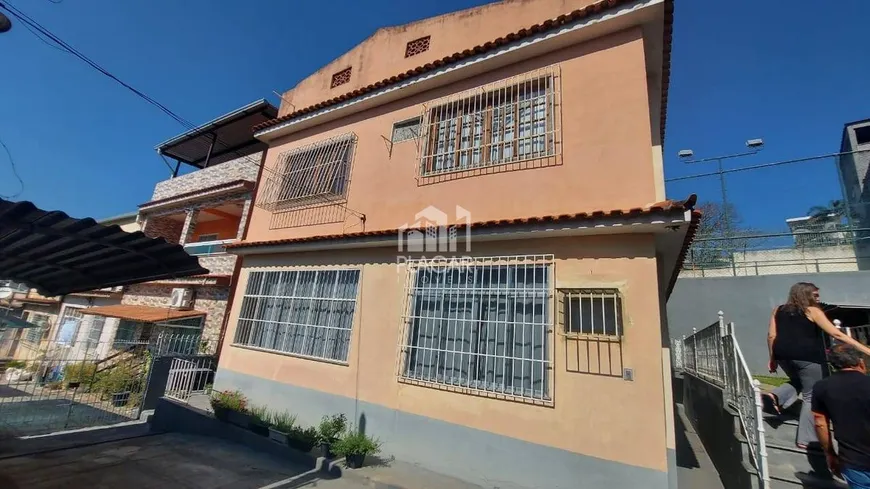 Foto 1 de Casa com 4 Quartos à venda, 180m² em Centro, Duque de Caxias