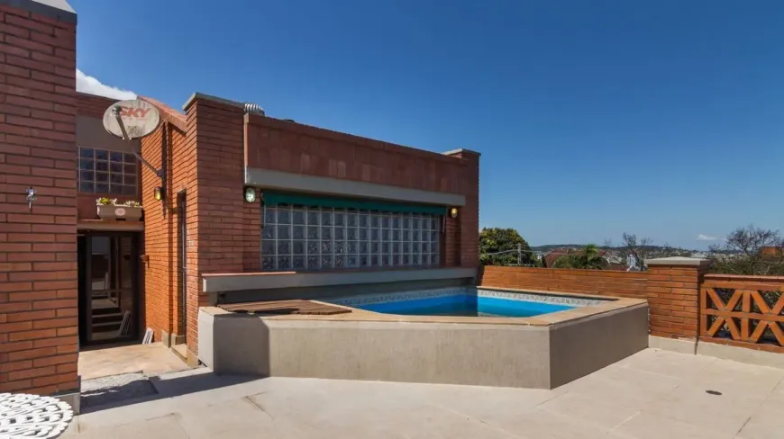 Foto 1 de Casa de Condomínio com 3 Quartos à venda, 360m² em Cristal, Porto Alegre