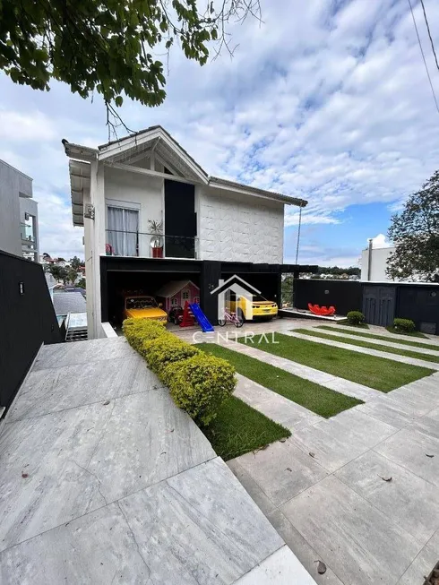 Foto 1 de Casa de Condomínio com 4 Quartos para venda ou aluguel, 460m² em Jardim das Cerejeiras, Arujá