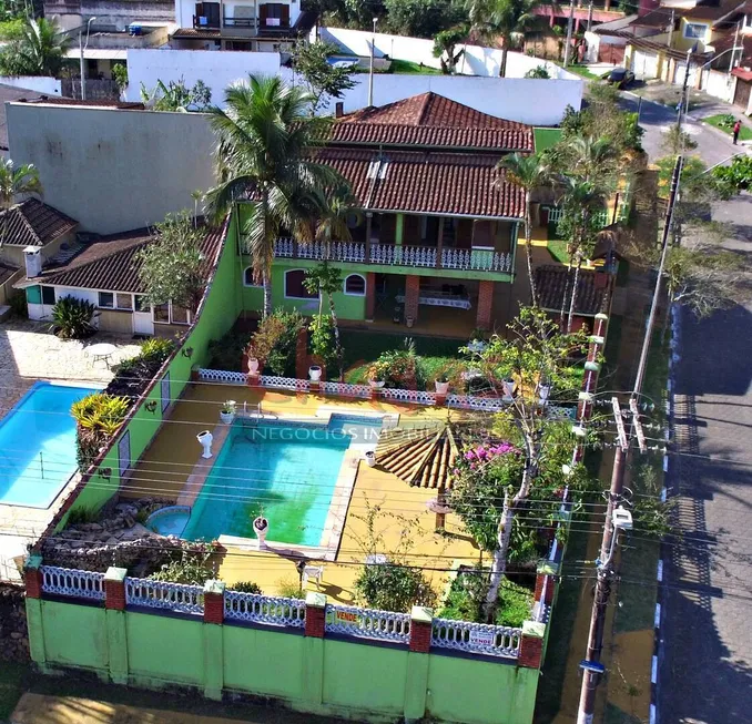 Foto 1 de Casa com 8 Quartos à venda, 650m² em Martim de Sa, Caraguatatuba