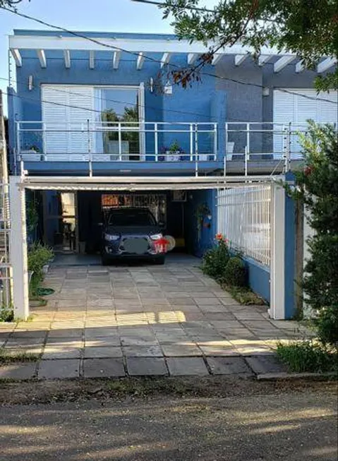 Foto 1 de Sobrado com 3 Quartos à venda, 193m² em Vila Ipiranga, Porto Alegre