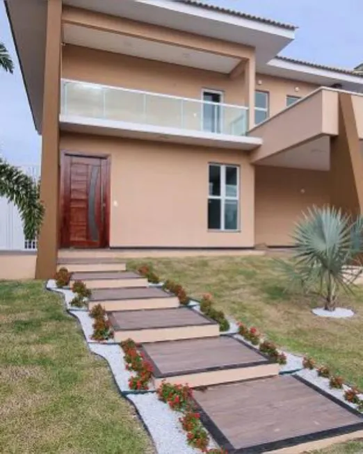 Foto 1 de Casa de Condomínio com 4 Quartos para alugar, 269m² em Coacu, Eusébio
