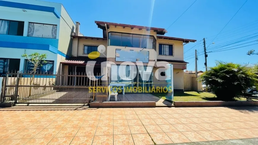 Foto 1 de Casa com 4 Quartos à venda, 100m² em Centro, Tramandaí