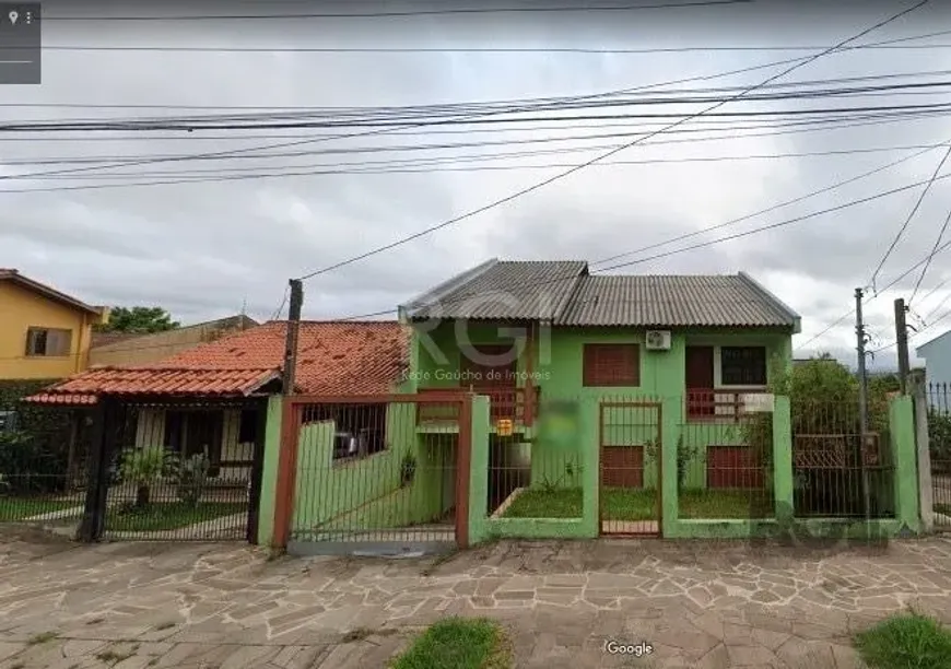 Foto 1 de Casa com 4 Quartos à venda, 203m² em Costa E Silva, Porto Alegre