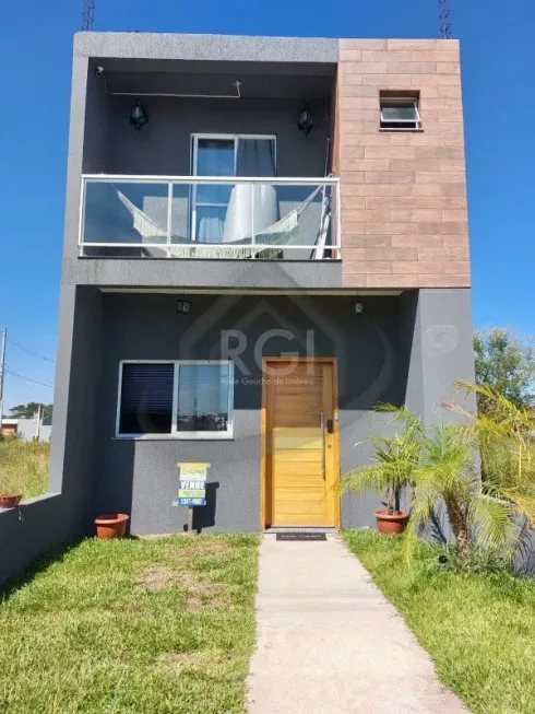 Foto 1 de Sobrado com 3 Quartos à venda, 147m² em Aberta dos Morros, Porto Alegre