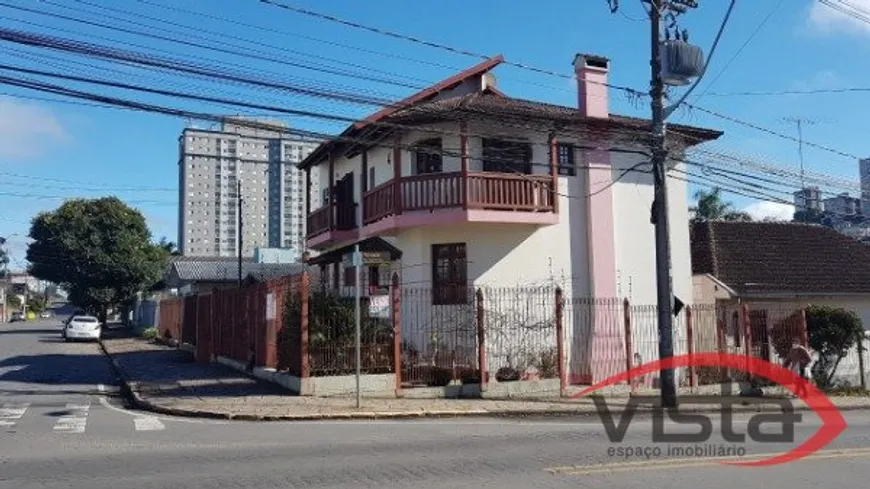 Foto 1 de Casa com 6 Quartos à venda, 245m² em Nossa Senhora de Lourdes, Caxias do Sul