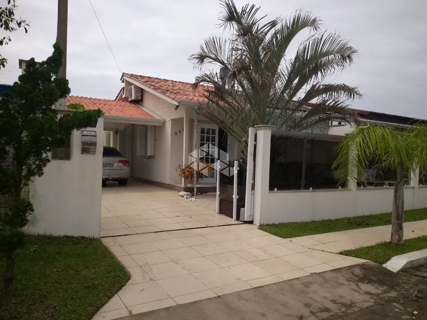 Foto 1 de Casa com 4 Quartos à venda, 200m² em Oásis do Sul, Tramandaí
