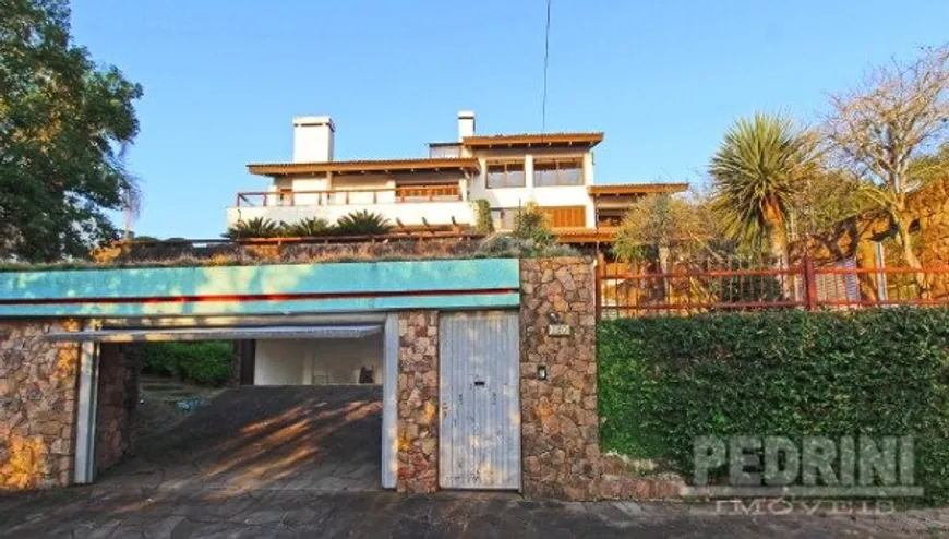 Foto 1 de Casa com 4 Quartos à venda, 601m² em Teresópolis, Porto Alegre