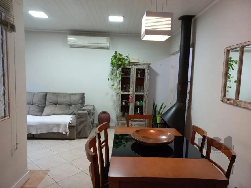 Foto 1 de Casa de Condomínio com 3 Quartos à venda, 118m² em Vila Nova, Porto Alegre
