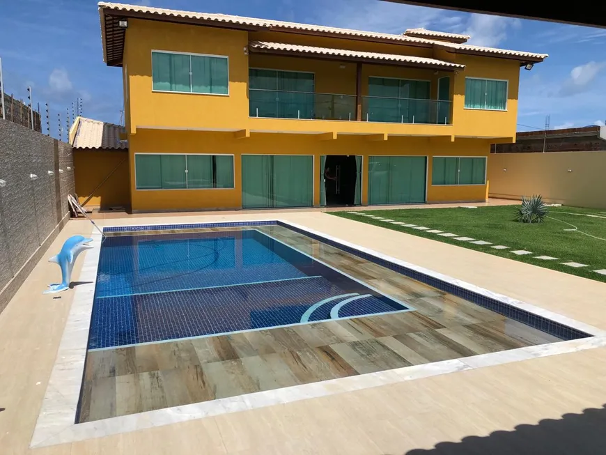 Foto 1 de Casa com 5 Quartos à venda, 600m² em Barra do Jacuípe, Camaçari