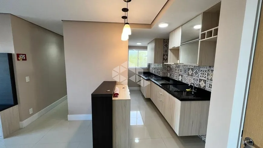 Foto 1 de Apartamento com 2 Quartos à venda, 52m² em Santa Fé, Gravataí