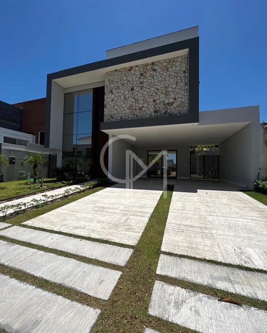 Foto 1 de Casa de Condomínio com 5 Quartos à venda, 323m² em Coacu, Eusébio