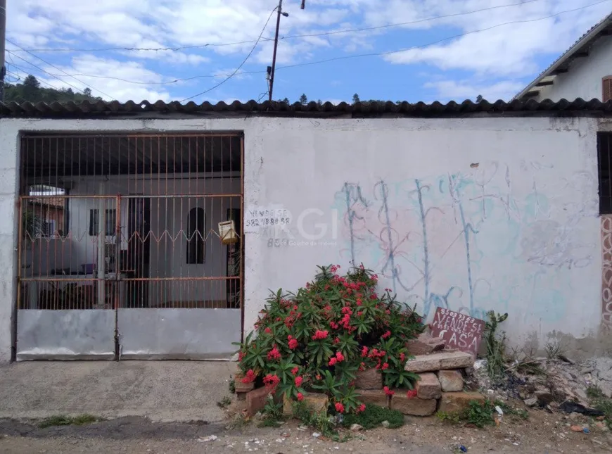 Foto 1 de Casa com 4 Quartos à venda, 119m² em Morro Santana, Porto Alegre