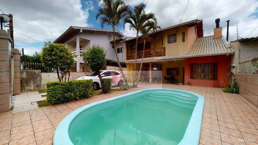 Foto 1 de Casa com 3 Quartos à venda, 300m² em Rubem Berta, Porto Alegre