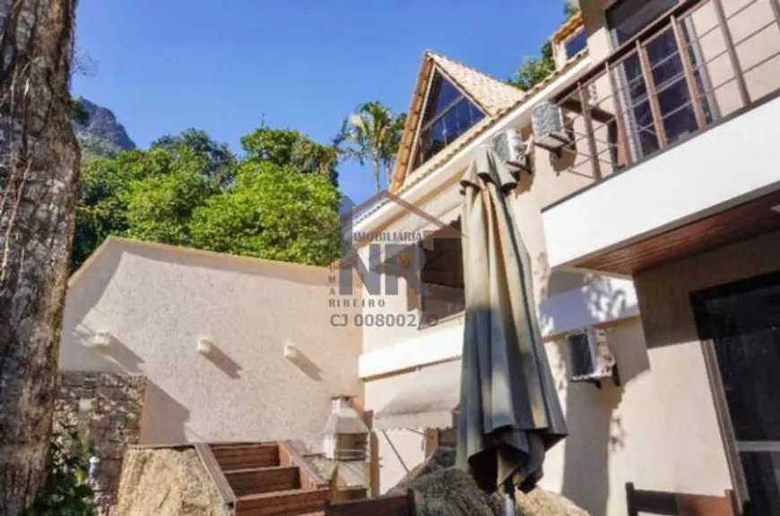 Foto 1 de Casa de Condomínio com 4 Quartos à venda, 80m² em Barra da Tijuca, Rio de Janeiro