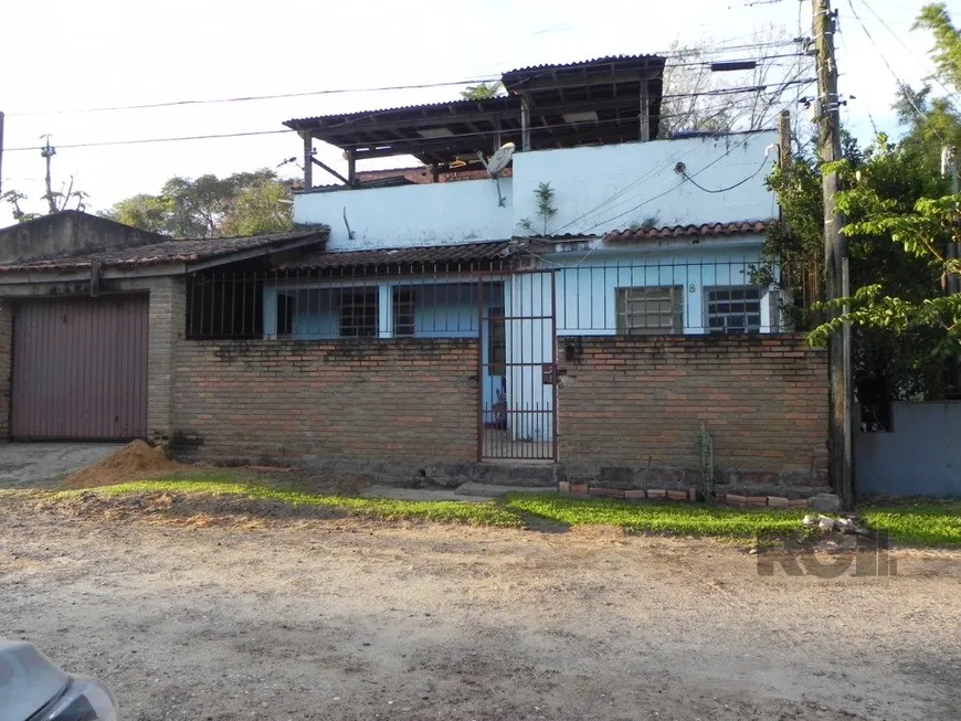 Foto 1 de Casa com 7 Quartos à venda, 258m² em Glória, Porto Alegre