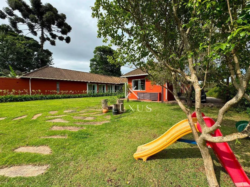 Foto 1 de Casa de Condomínio com 4 Quartos à venda, 500m² em Morro do Chapéu, Nova Lima