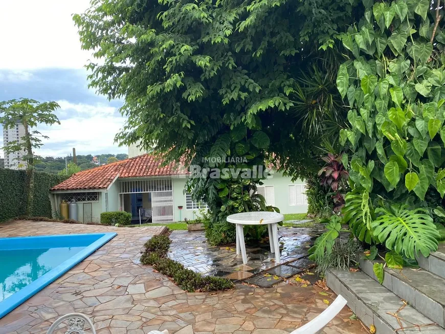 Foto 1 de Casa com 4 Quartos à venda, 369m² em Country, Cascavel