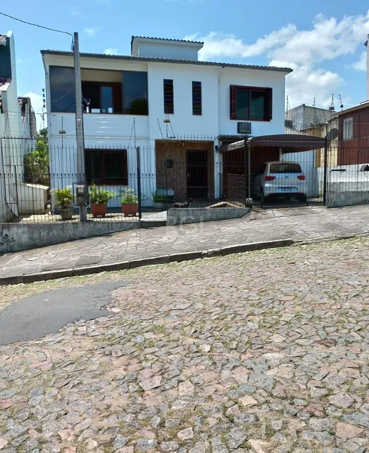 Foto 1 de Casa com 3 Quartos à venda, 164m² em Vila João Pessoa, Porto Alegre