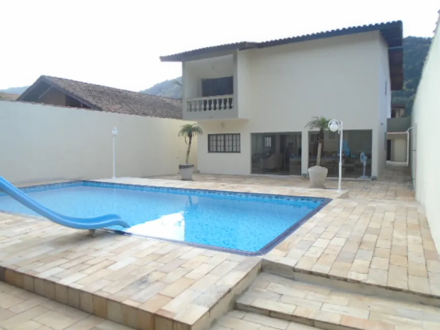 Foto 1 de Casa com 4 Quartos à venda, 240m² em Jardim Guaiúba, Guarujá