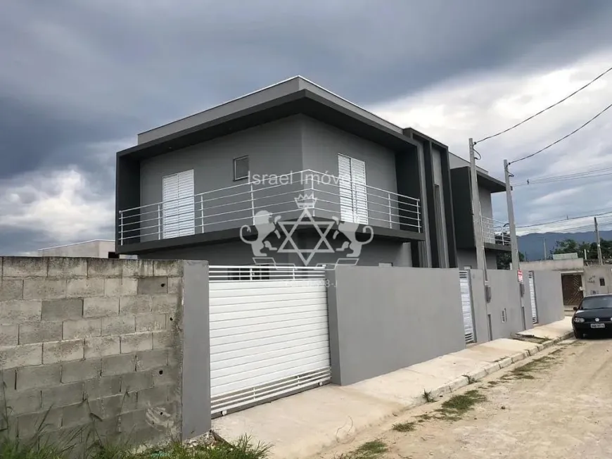 Foto 1 de Sobrado com 3 Quartos à venda, 102m² em Praia Das Palmeiras, Caraguatatuba