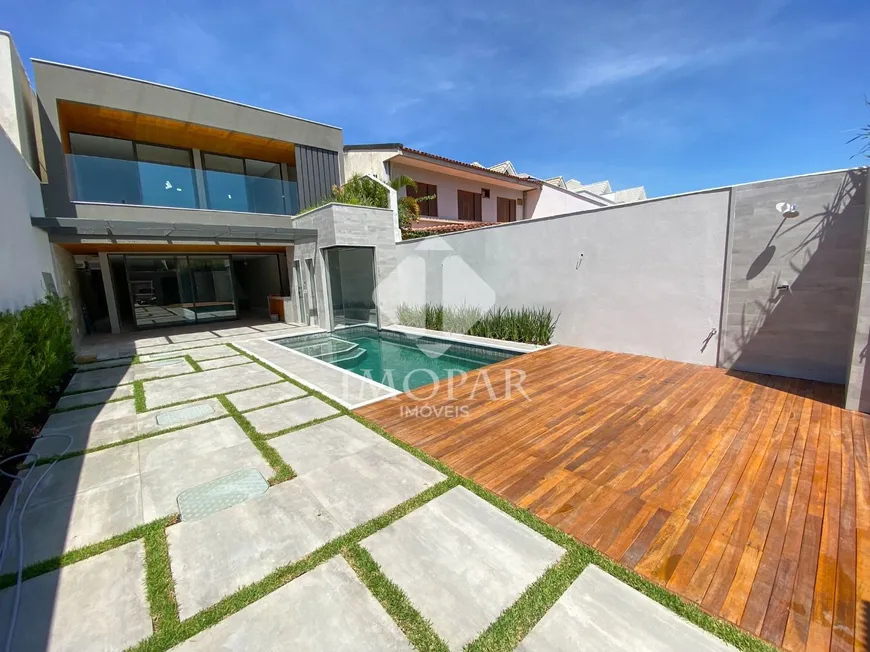 Foto 1 de Casa de Condomínio com 5 Quartos à venda, 360m² em Barra da Tijuca, Rio de Janeiro