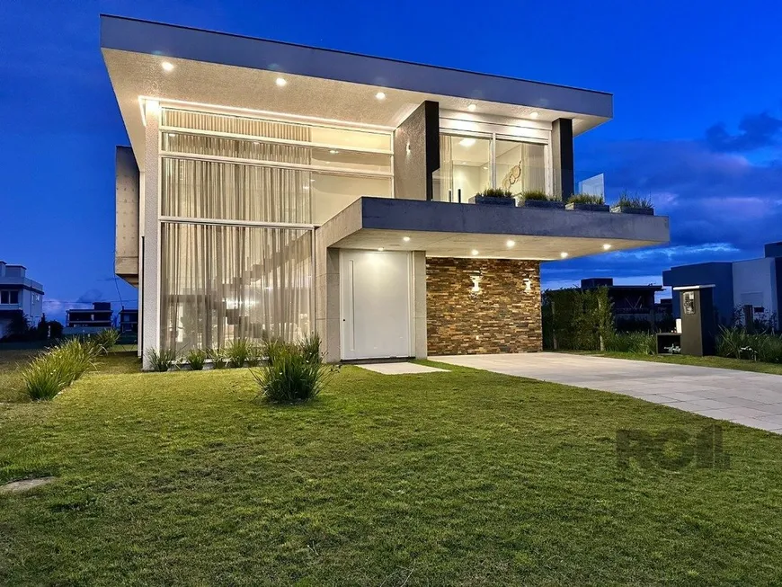 Foto 1 de Casa de Condomínio com 4 Quartos à venda, 349m² em Capao Novo, Capão da Canoa