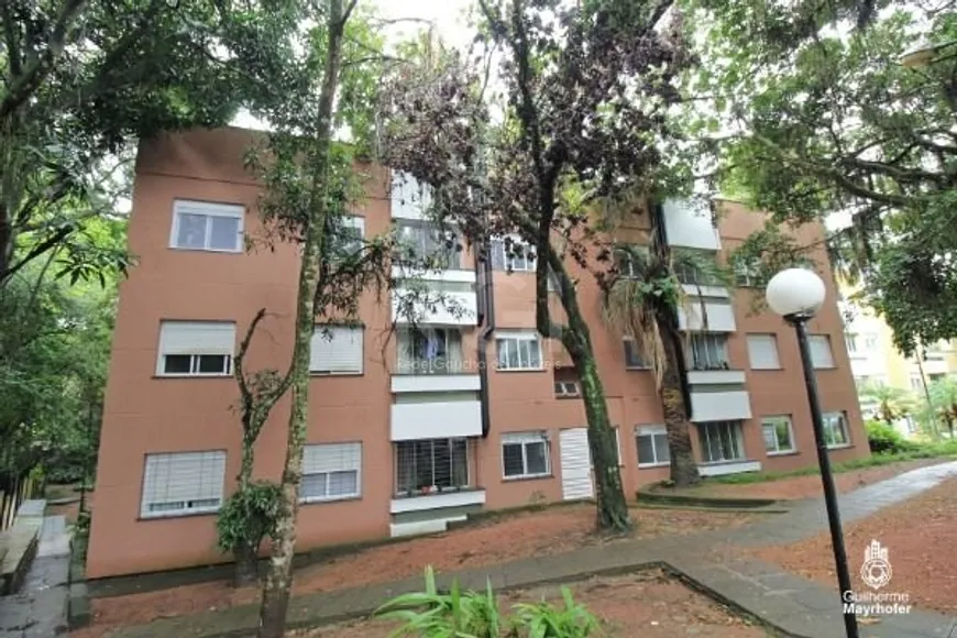 Foto 1 de Apartamento com 3 Quartos à venda, 67m² em Guarujá, Porto Alegre