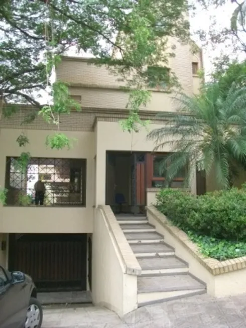 Foto 1 de Casa de Condomínio com 4 Quartos à venda, 384m² em Menino Deus, Porto Alegre