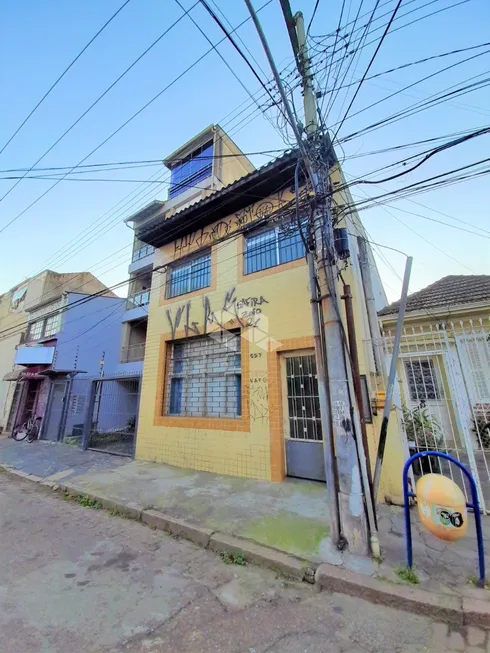 Foto 1 de Casa com 6 Quartos à venda, 189m² em Cidade Baixa, Porto Alegre