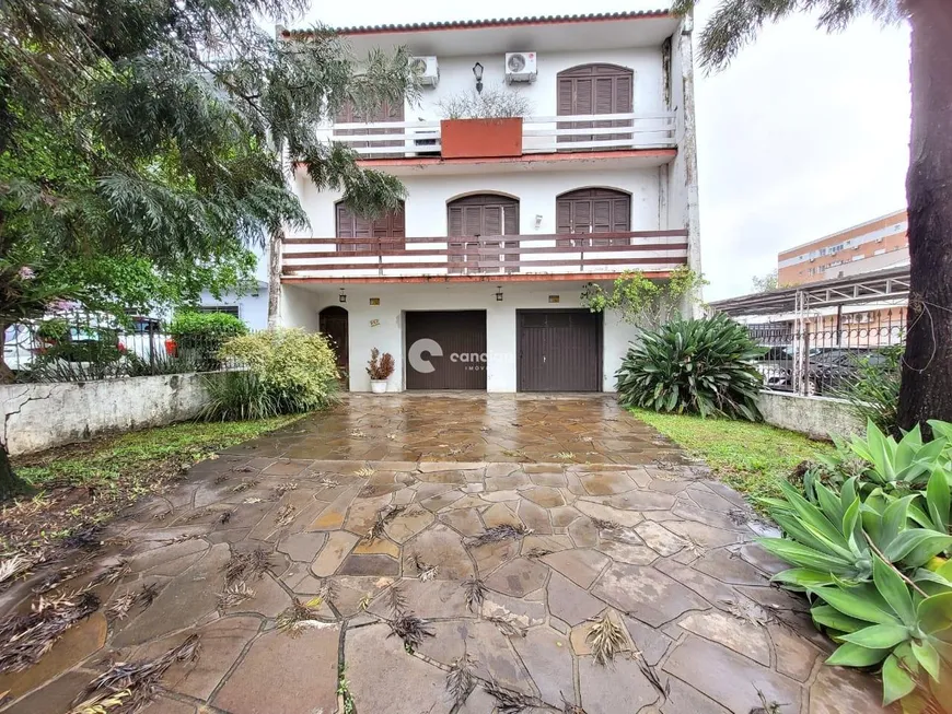 Foto 1 de Casa com 5 Quartos para alugar, 350m² em Centro, Santa Maria