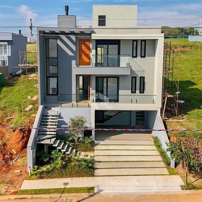Foto 1 de Casa de Condomínio com 3 Quartos à venda, 233m² em Coronel Nassuca, Guaíba