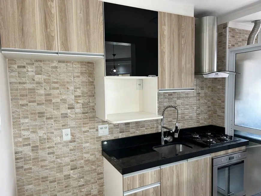 Foto 1 de Apartamento com 2 Quartos à venda, 52m² em Jardim Henriqueta, Taboão da Serra