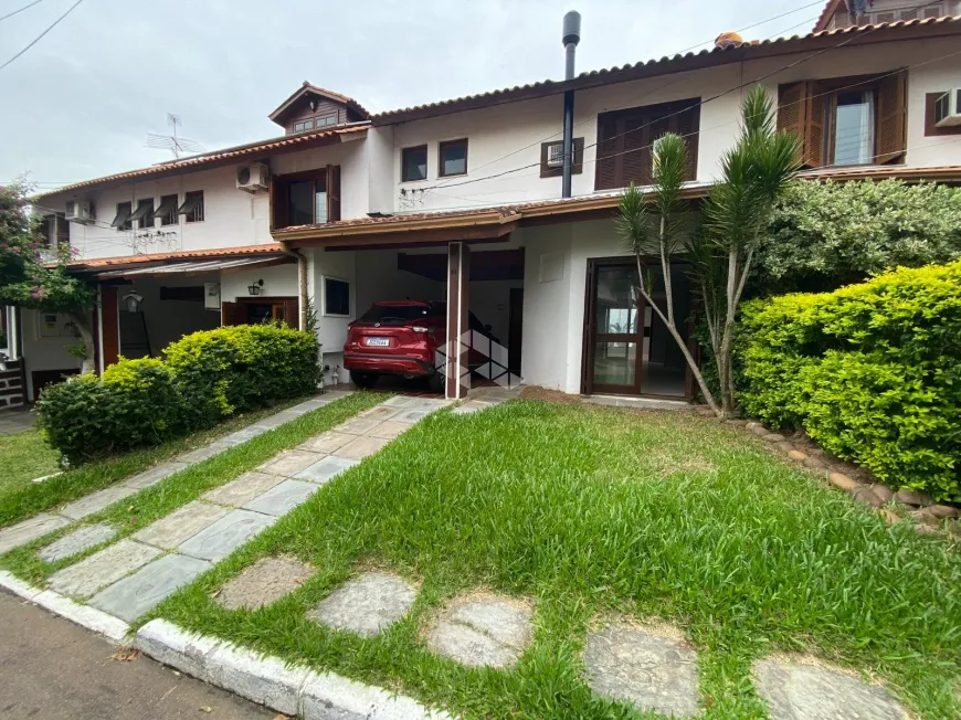 Foto 1 de Casa de Condomínio com 3 Quartos à venda, 106m² em Ipanema, Porto Alegre