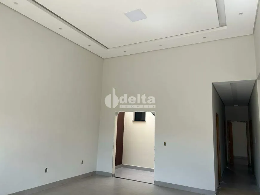 Foto 1 de Casa com 3 Quartos à venda, 114m² em Novo Mundo, Uberlândia