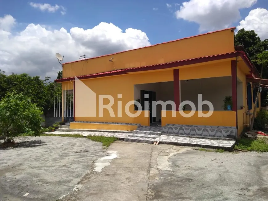 Foto 1 de Casa com 4 Quartos à venda, 220m² em Imbarie, Duque de Caxias