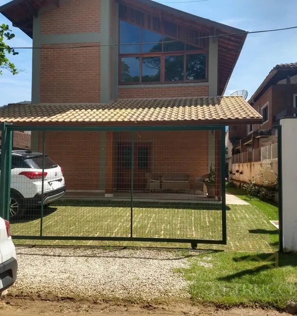 Foto 1 de Casa de Condomínio com 4 Quartos à venda, 224m² em Lagoinha, Ubatuba